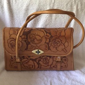 Carved leather purse